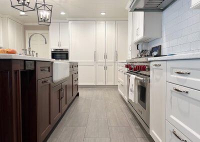 Stainless Steel Range Hood, Stainless Steel Wolf Range, White Kitchen Backsplash Tiles, White Kitchen Countertop Island, Kitchen Walkway