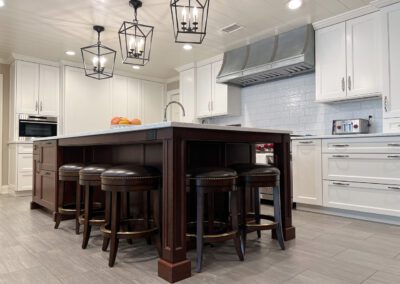 White Kitchen Stainless Steel Range Hood, Kitchen Island Sideview, Decorative Lights, Custom Integrated Island Outlet, Kitchen Barstools, Kitchen Backsplash