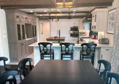 Kitchen View from Dinning Table - White Kitchen with center Island