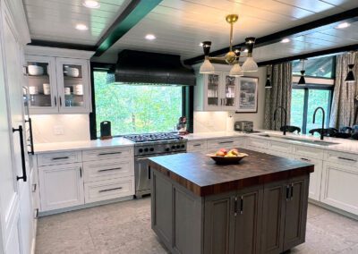 Window View - Wolf Gas Range, Coppersmith Metal Hood, Center Island white Kitchen