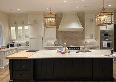 white painted kitchen, black island with butcher blocks