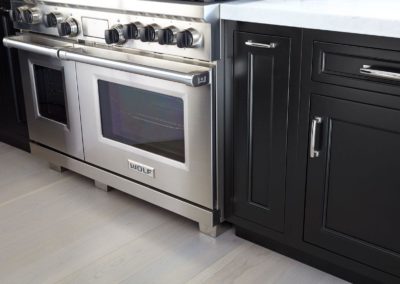 black cabinets - black and white kitchen